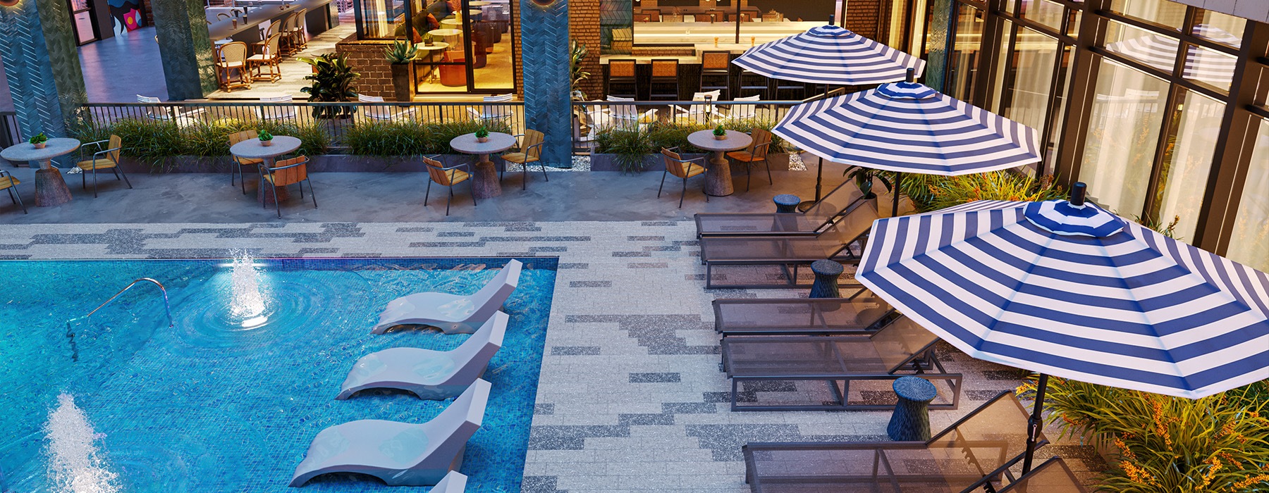 a pool with lounge chairs and umbrellas next to it